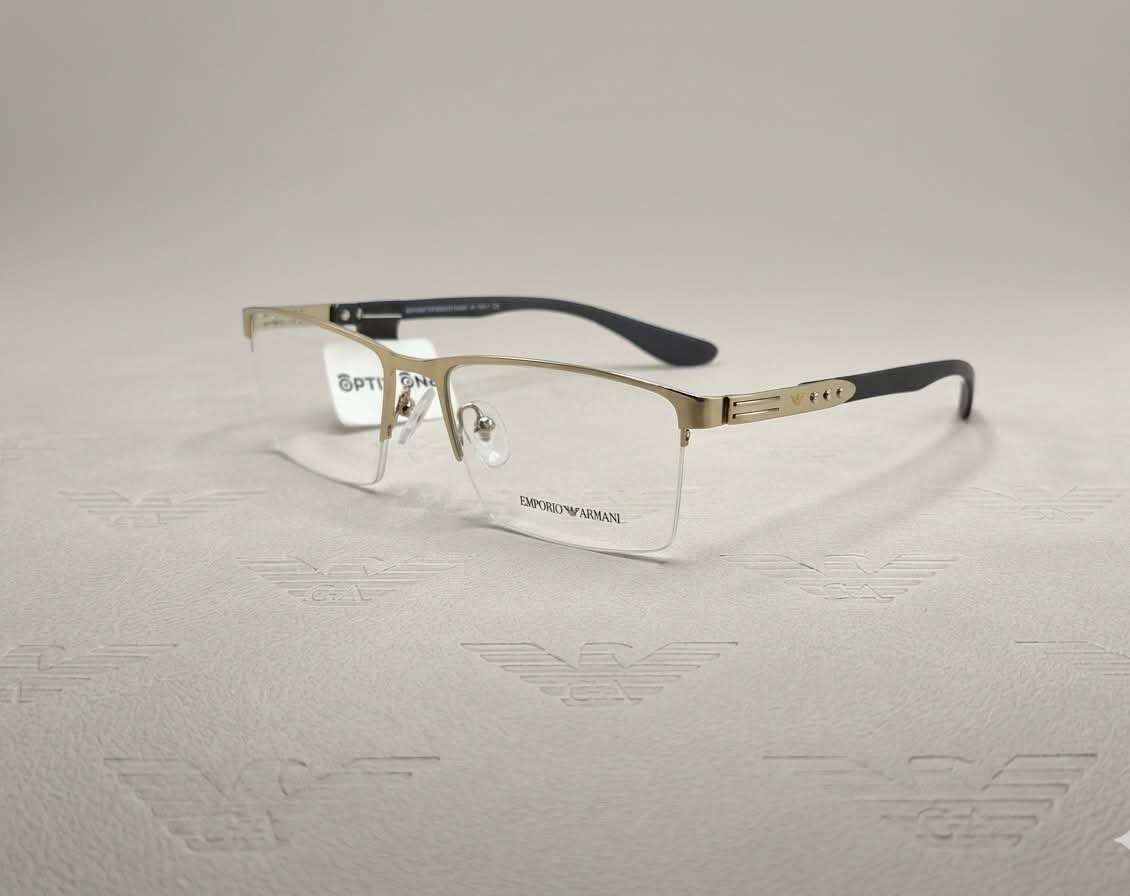 Gold half-rim eyeglasses Style 6767 with black temple accents, Optix One Pakistan