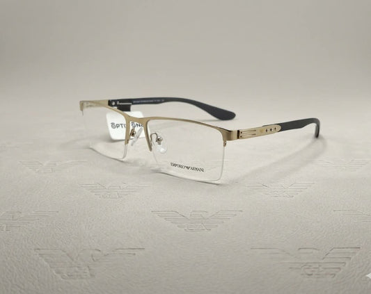 Gold half-rim eyeglasses Style 6767 with black temple accents, Optix One Pakistan